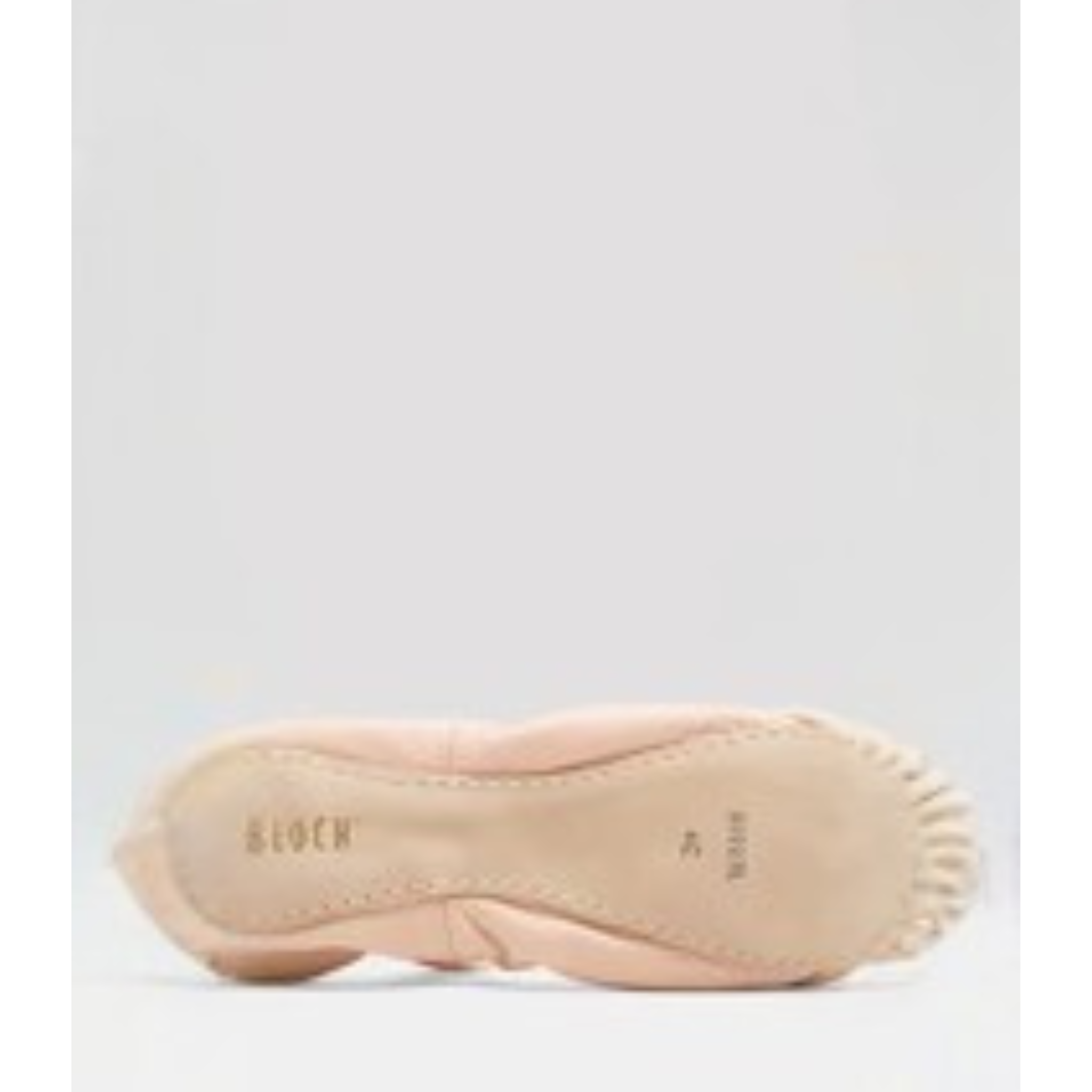 Bloch S0227G Children Belle Leather Ballet Shoe Bottom Sole View. The inside displays a white fabric with pink small hearts throughout. In addition, this style is full sole and has one elastic strap.