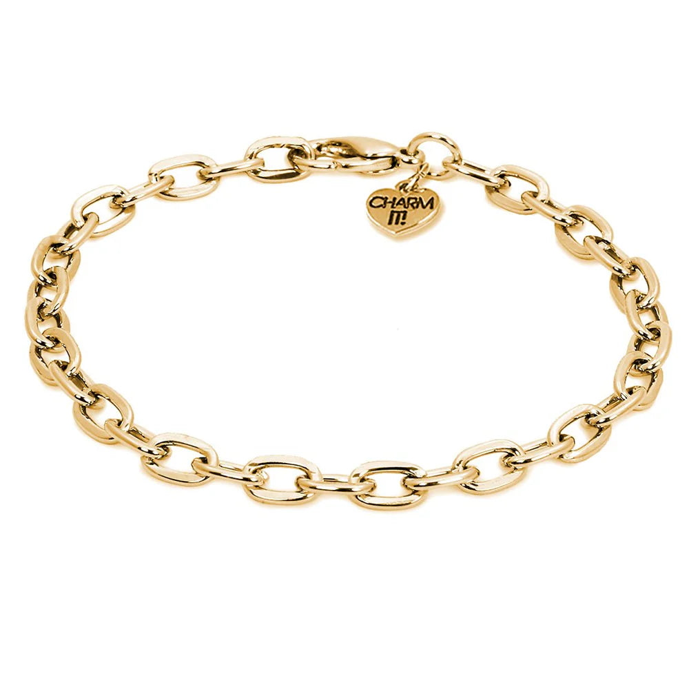 Gold chain bracelet with a heart-shaped charm.